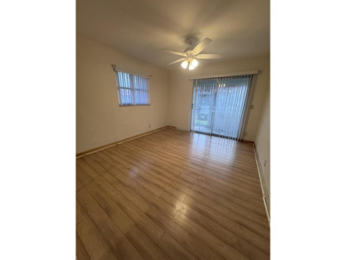 Two-bedroom, 2 bath, end unit villa in the Seville section of on Kings Point Golf - Executive in Florida - for sale on GolfHomes.com, golf home, golf lot