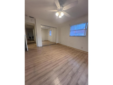 Two-bedroom, 2 bath, end unit villa in the Seville section of on Kings Point Golf - Executive in Florida - for sale on GolfHomes.com, golf home, golf lot