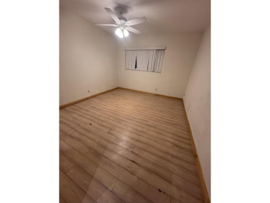 Two-bedroom, 2 bath, end unit villa in the Seville section of on Kings Point Golf - Executive in Florida - for sale on GolfHomes.com, golf home, golf lot