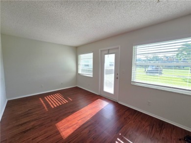 Charming 1BR/1BA First Floor Condo in Vista Royale a 55+ Active on The American Golf Club in Florida - for sale on GolfHomes.com, golf home, golf lot