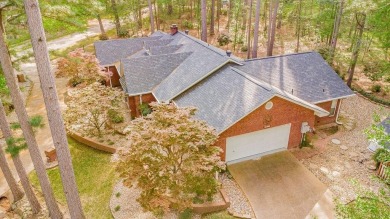Welcome to this Traditional Red Brick home located on a highly on Hide-A-Way Lake Golf Course in Texas - for sale on GolfHomes.com, golf home, golf lot