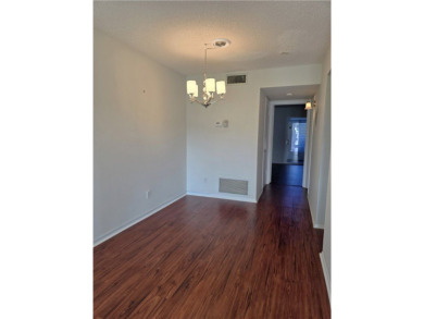 Charming 1BR/1BA First Floor Condo in Vista Royale a 55+ Active on The American Golf Club in Florida - for sale on GolfHomes.com, golf home, golf lot