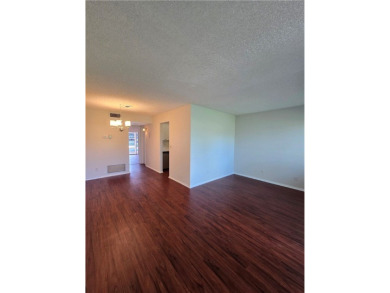 Charming 1BR/1BA First Floor Condo in Vista Royale a 55+ Active on The American Golf Club in Florida - for sale on GolfHomes.com, golf home, golf lot