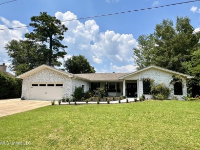 You'll love all of the charm and character that this Diamondhead on Diamondhead Country Club in Mississippi - for sale on GolfHomes.com, golf home, golf lot