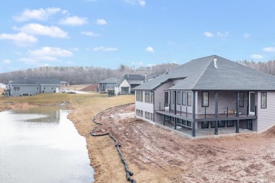 Stunning custom built luxury condo in sought after Augusta Hills on Mr Golfs Ultimate Range in Wisconsin - for sale on GolfHomes.com, golf home, golf lot