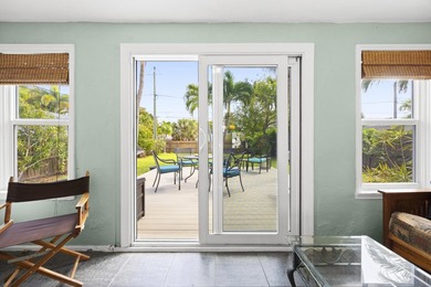 Key West style Cottage in the heart of the Parrot Cove on Lake Worth Municipal Golf Course in Florida - for sale on GolfHomes.com, golf home, golf lot