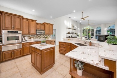 Under contract-accepting backup offers. Exquisite Luxury Retreat on Tarpon Woods Golf Club in Florida - for sale on GolfHomes.com, golf home, golf lot