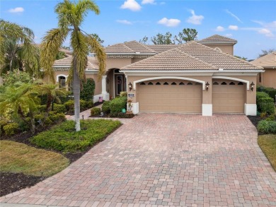 An exquisite residence awaits you in Lakewood Ranch Country Club on Lakewood Ranch Golf and Country Club in Florida - for sale on GolfHomes.com, golf home, golf lot