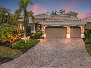 An exquisite residence awaits you in Lakewood Ranch Country Club on Lakewood Ranch Golf and Country Club in Florida - for sale on GolfHomes.com, golf home, golf lot