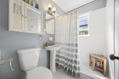 Key West style Cottage in the heart of the Parrot Cove on Lake Worth Municipal Golf Course in Florida - for sale on GolfHomes.com, golf home, golf lot