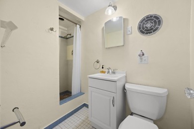 Key West style Cottage in the heart of the Parrot Cove on Lake Worth Municipal Golf Course in Florida - for sale on GolfHomes.com, golf home, golf lot