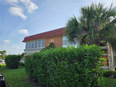 Your canvas awaits! Just needs a little TLC to make it shine on The American Golf Club in Florida - for sale on GolfHomes.com, golf home, golf lot