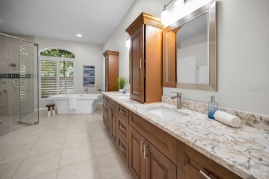 Under contract-accepting backup offers. Exquisite Luxury Retreat on Tarpon Woods Golf Club in Florida - for sale on GolfHomes.com, golf home, golf lot