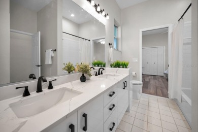 Under contract-accepting backup offers. Exquisite Luxury Retreat on Tarpon Woods Golf Club in Florida - for sale on GolfHomes.com, golf home, golf lot