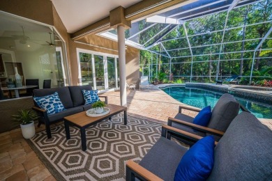 Under contract-accepting backup offers. Exquisite Luxury Retreat on Tarpon Woods Golf Club in Florida - for sale on GolfHomes.com, golf home, golf lot