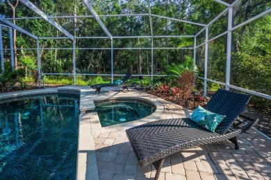 Under contract-accepting backup offers. Exquisite Luxury Retreat on Tarpon Woods Golf Club in Florida - for sale on GolfHomes.com, golf home, golf lot