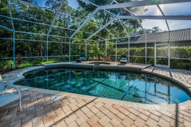 Under contract-accepting backup offers. Exquisite Luxury Retreat on Tarpon Woods Golf Club in Florida - for sale on GolfHomes.com, golf home, golf lot
