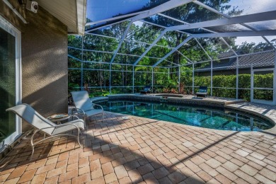 Under contract-accepting backup offers. Exquisite Luxury Retreat on Tarpon Woods Golf Club in Florida - for sale on GolfHomes.com, golf home, golf lot