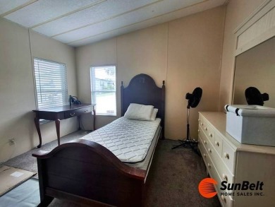 Charming 2 Bedroom / 2 Bath BARR Home in Rolling Greens Village on Rolling Greens Executive Golf Community in Florida - for sale on GolfHomes.com, golf home, golf lot