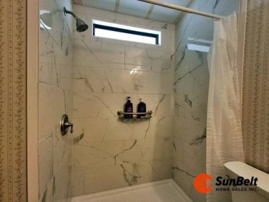 Charming 2 Bedroom / 2 Bath BARR Home in Rolling Greens Village on Rolling Greens Executive Golf Community in Florida - for sale on GolfHomes.com, golf home, golf lot