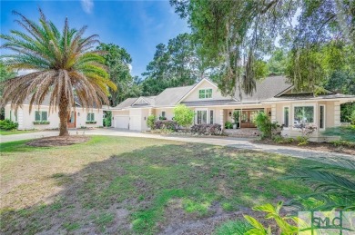 This luxurious oasis is nestled among live oaks with gorgeous on The Landings Club - Plantation in Georgia - for sale on GolfHomes.com, golf home, golf lot