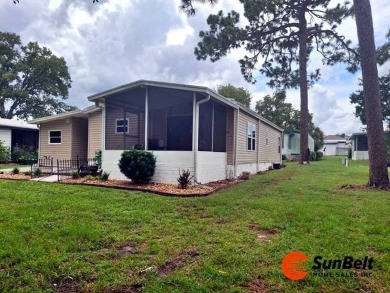 Charming 2 Bedroom / 2 Bath BARR Home in Rolling Greens Village on Rolling Greens Executive Golf Community in Florida - for sale on GolfHomes.com, golf home, golf lot