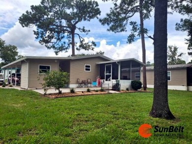 Charming 2 Bedroom / 2 Bath BARR Home in Rolling Greens Village on Rolling Greens Executive Golf Community in Florida - for sale on GolfHomes.com, golf home, golf lot