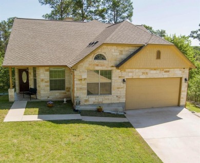 This immaculate custom home, consisting of 3 lots totaling on Pine Forest Golf Club in Texas - for sale on GolfHomes.com, golf home, golf lot