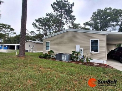 Charming 2 Bedroom / 2 Bath BARR Home in Rolling Greens Village on Rolling Greens Executive Golf Community in Florida - for sale on GolfHomes.com, golf home, golf lot