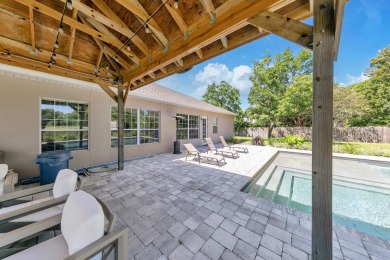 33 E Country Club Drive offers luxurious indoor living as well on Indian Bayou Golf and Country Club in Florida - for sale on GolfHomes.com, golf home, golf lot