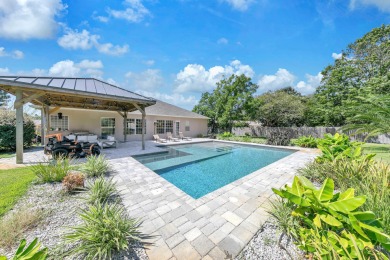 33 E Country Club Drive offers luxurious indoor living as well on Indian Bayou Golf and Country Club in Florida - for sale on GolfHomes.com, golf home, golf lot