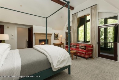 Nestled in the prestigious Maroon Green Townhomes, this on Maroon Creek Club in Colorado - for sale on GolfHomes.com, golf home, golf lot