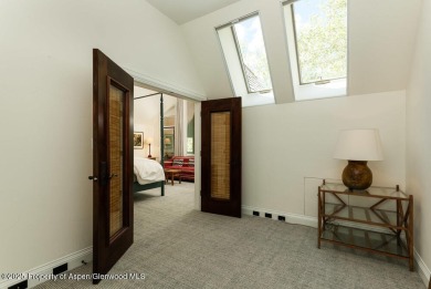Nestled in the prestigious Maroon Green Townhomes, this on Maroon Creek Club in Colorado - for sale on GolfHomes.com, golf home, golf lot