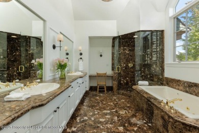 Nestled in the prestigious Maroon Green Townhomes, this on Maroon Creek Club in Colorado - for sale on GolfHomes.com, golf home, golf lot