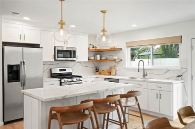 This thoughtfully curated 2-bedroom, 2-bath residence is ideally on Palm Desert Country Club in California - for sale on GolfHomes.com, golf home, golf lot