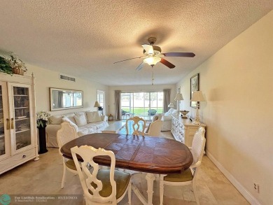 This beautifully updated 1st-floor corner condo offers a perfect on Palm-Aire Country Club and Resort - Palms in Florida - for sale on GolfHomes.com, golf home, golf lot