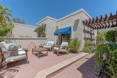 Lovely Spanish Mediterranean style home in the highly sought on Arizona Grand Resort Golf Course in Arizona - for sale on GolfHomes.com, golf home, golf lot