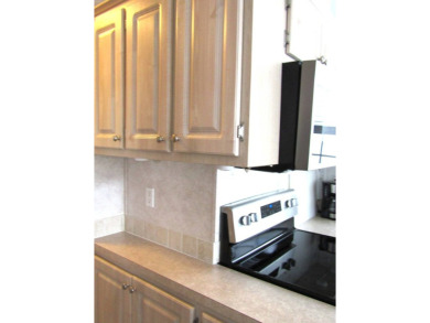 Welcome to your new DREAM HOME, located at 205 Arnold Palmer Dr on Deer Creek RV Golf Resort in Florida - for sale on GolfHomes.com, golf home, golf lot