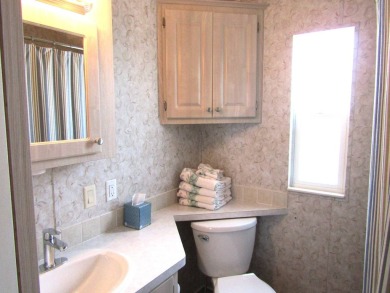Welcome to your new DREAM HOME, located at 205 Arnold Palmer Dr on Deer Creek RV Golf Resort in Florida - for sale on GolfHomes.com, golf home, golf lot