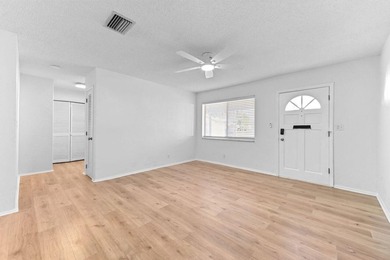This move-in ready, newly renovated and spacious three bedroom on Leisureville Community Association in Florida - for sale on GolfHomes.com, golf home, golf lot