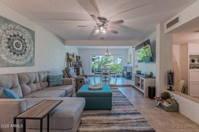 Lovely Spanish Mediterranean style home in the highly sought on Arizona Grand Resort Golf Course in Arizona - for sale on GolfHomes.com, golf home, golf lot