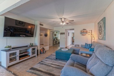 Lovely Spanish Mediterranean style home in the highly sought on Arizona Grand Resort Golf Course in Arizona - for sale on GolfHomes.com, golf home, golf lot