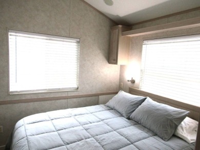 Welcome to your new DREAM HOME, located at 205 Arnold Palmer Dr on Deer Creek RV Golf Resort in Florida - for sale on GolfHomes.com, golf home, golf lot