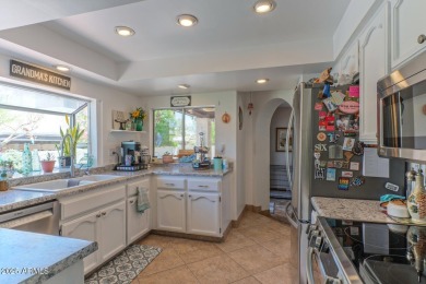 Lovely Spanish Mediterranean style home in the highly sought on Arizona Grand Resort Golf Course in Arizona - for sale on GolfHomes.com, golf home, golf lot