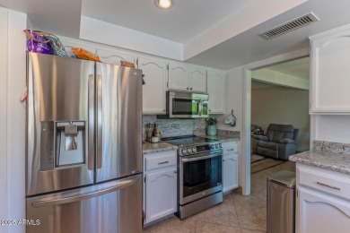 Lovely Spanish Mediterranean style home in the highly sought on Arizona Grand Resort Golf Course in Arizona - for sale on GolfHomes.com, golf home, golf lot