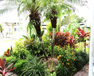 Welcome to your new DREAM HOME, located at 205 Arnold Palmer Dr on Deer Creek RV Golf Resort in Florida - for sale on GolfHomes.com, golf home, golf lot
