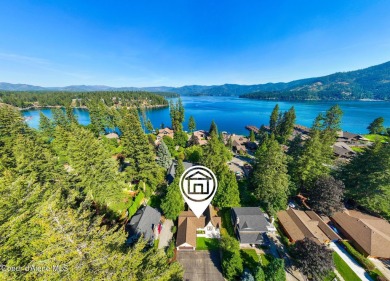 Cozy home with old-world charm coupled with modern conveniences on Hayden Lake Country Club in Idaho - for sale on GolfHomes.com, golf home, golf lot