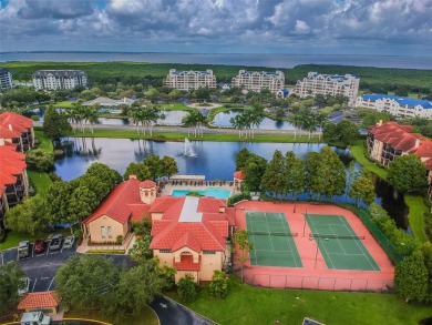 Location, lifestyle, and effortless convenience come together in on Feather Sound Country Club in Florida - for sale on GolfHomes.com, golf home, golf lot