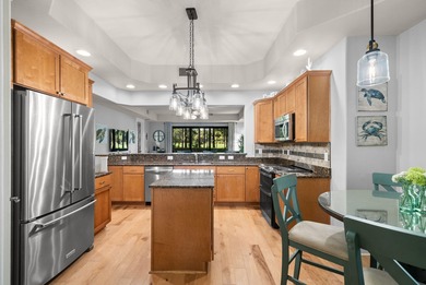 Enjoy the perfect blend of comfort and elegance in this on Sharks Tooth Golf Club in Florida - for sale on GolfHomes.com, golf home, golf lot