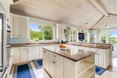 West Indies-inspired 3BR/3.5BA estate on .62 acres overlooking on Orchid Island Golf and Beach Club in Florida - for sale on GolfHomes.com, golf home, golf lot